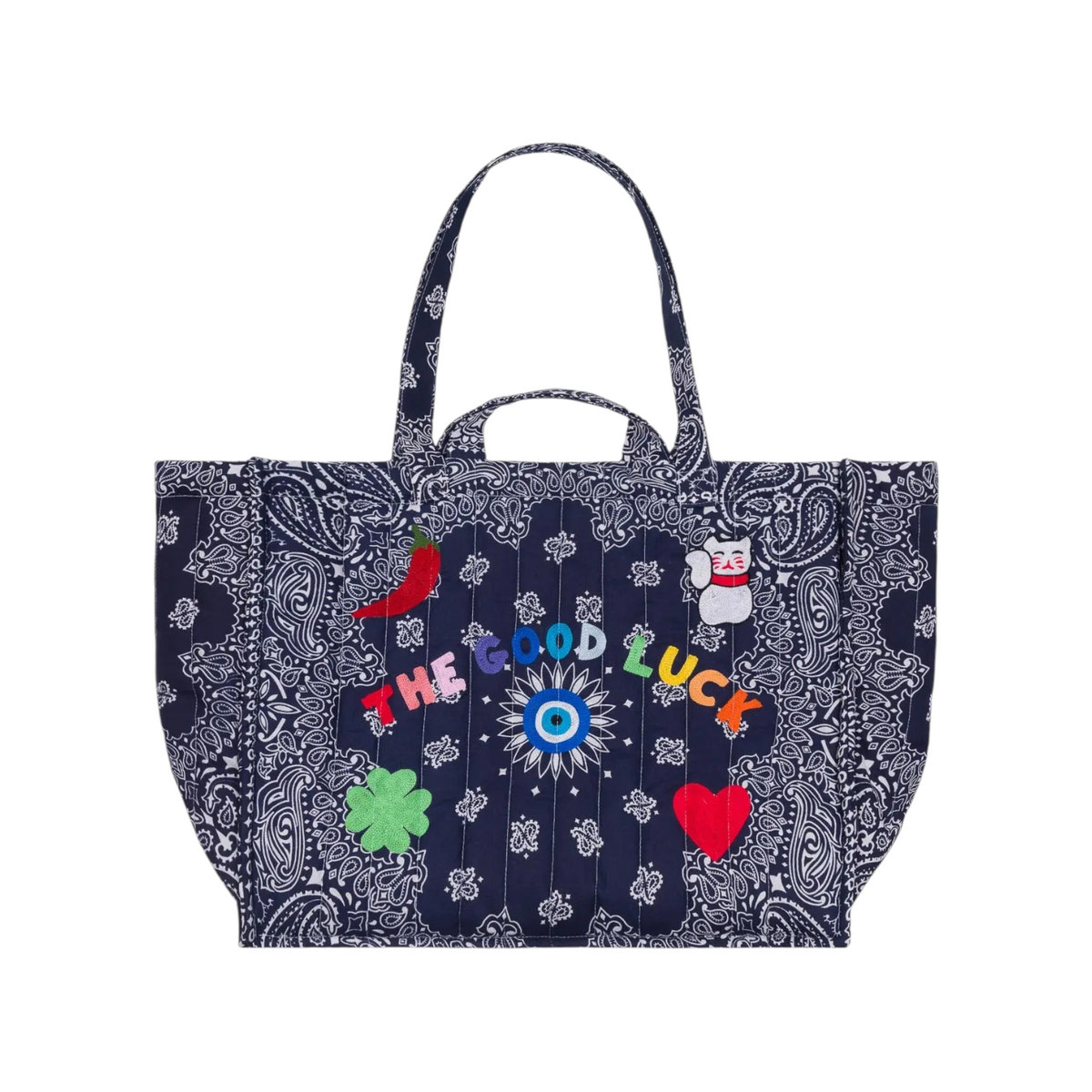 The Tiny Finch navy quilted tote bag with paisley print and colorful embroidered lucky charms and text.