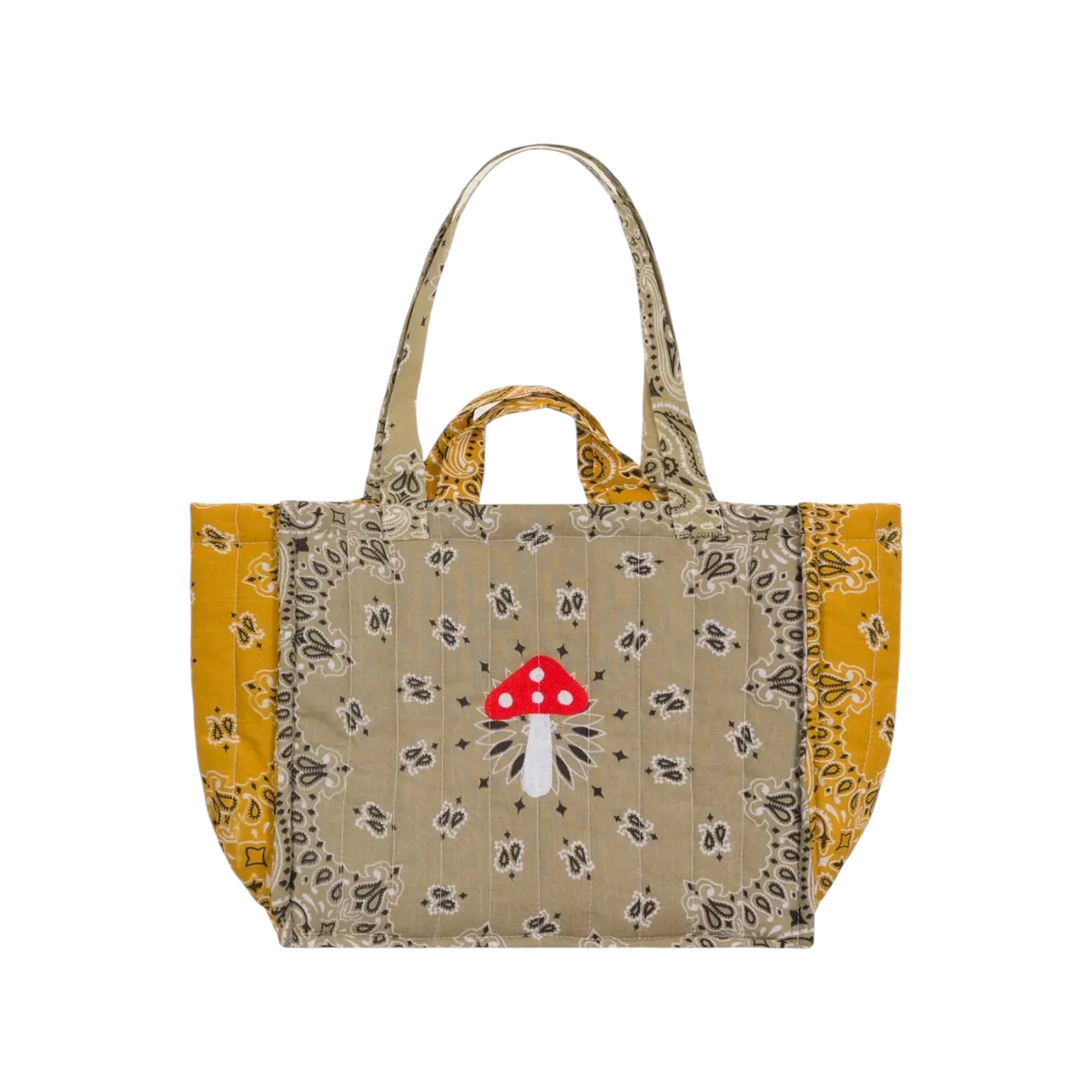 The Tiny Finch quilted beige tote bag with a red mushroom embroidery and yellow paisley side panels.