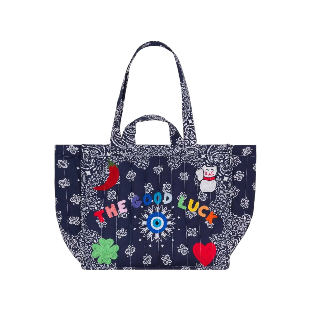The Tiny Finch navy quilted tote bag with colorful embroidered lucky charms and The Good Luck text