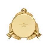The Tiny Finch polished bronze Bee Candle Pedestal featuring intricate bee motifs for Trudon classic candles.