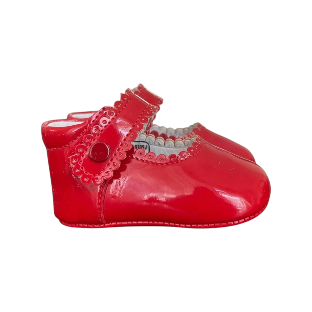 The Tiny Finch red patent Mary Jane baby shoes with scalloped strap detail and soft leather lining