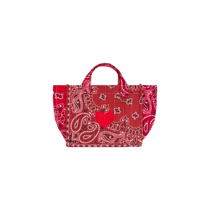 The Tiny Finch mini quilted tote bag in vintage red paisley print with a central heart embroidery and two handles.