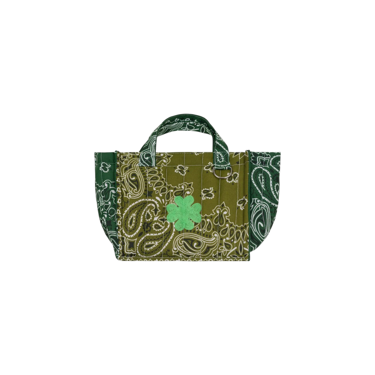 The Tiny Finch mini quilted tote bag in green paisley print with a clover embroidery and dual carry handles.