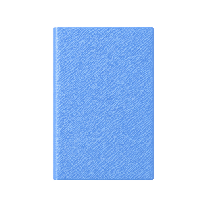 The Tiny Finch blue Panama pocket notebook in crossgrain lambskin leather, viewed from the front.