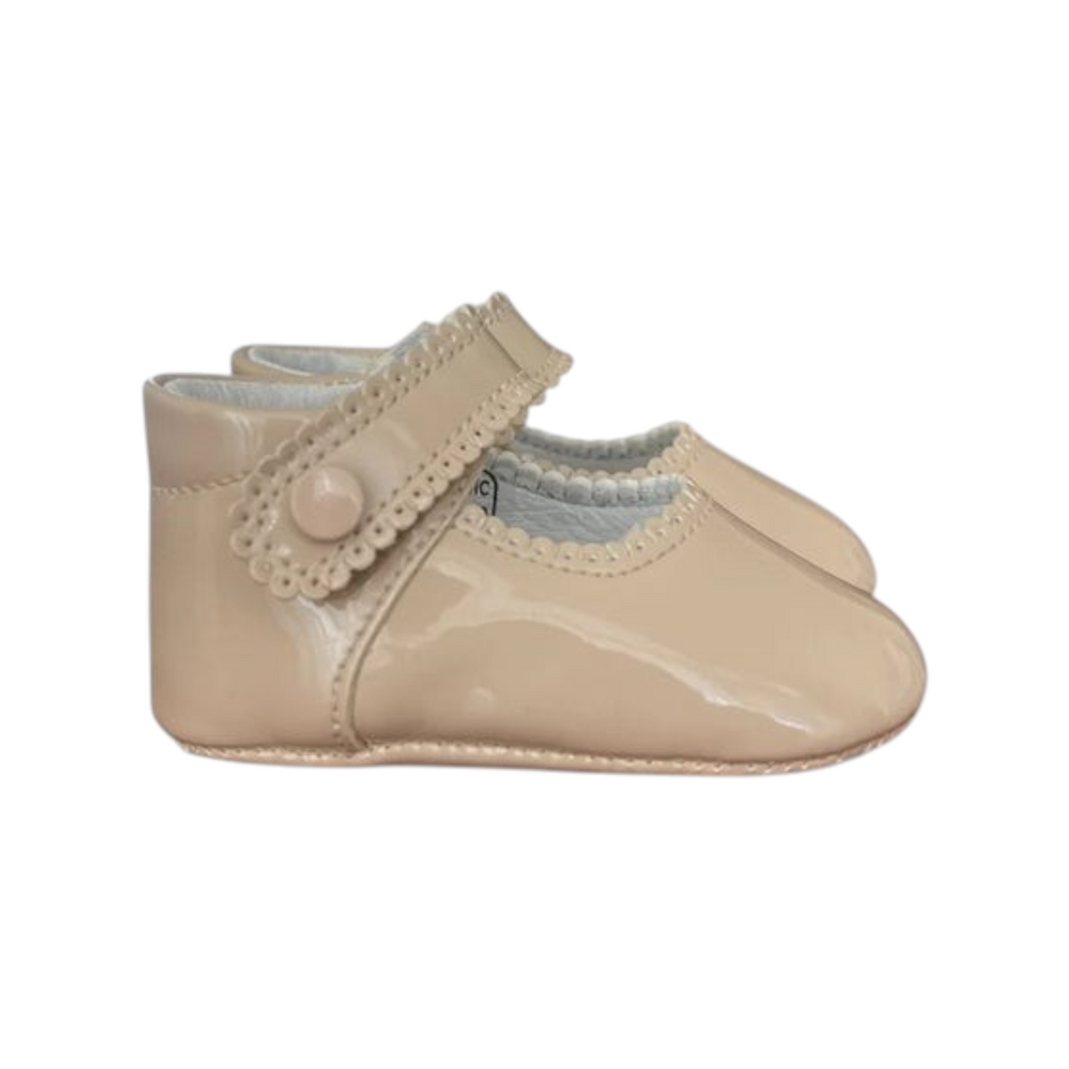 The Tiny Finch Sophia baby Mary Jane shoes in oat patent finish with scalloped strap and genuine leather lining.