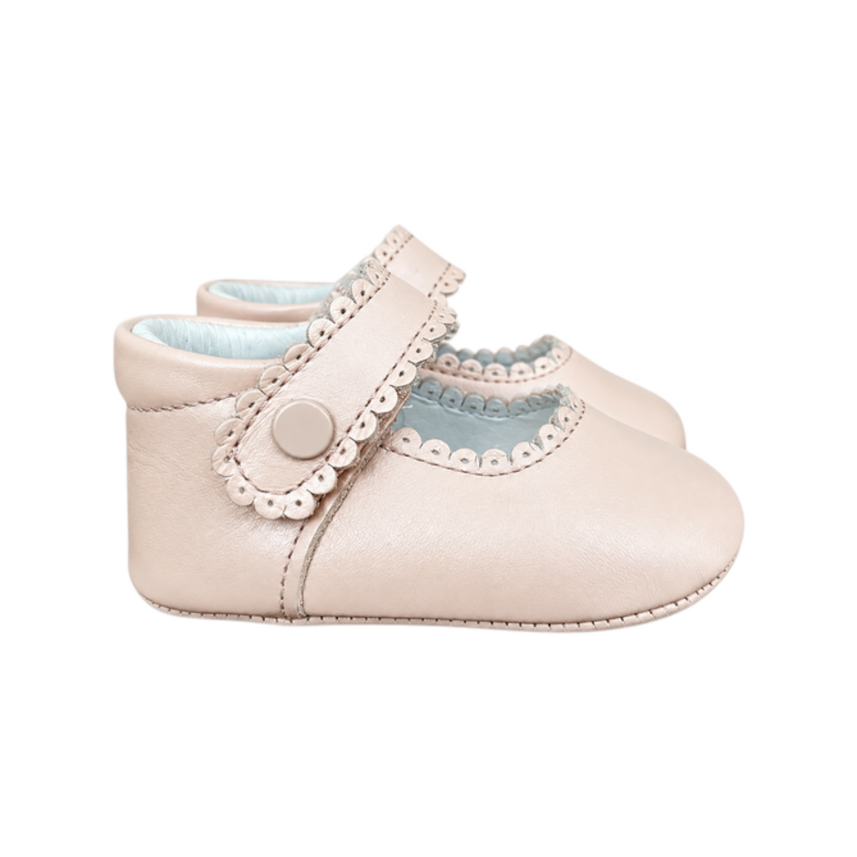 The Tiny Finch Sophia Oat baby Mary Jane shoes in soft pink with scalloped trim and a vegan outsole.