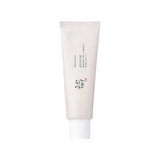 The Tiny Finch Relief Sun Rice organic sunscreen in a white squeeze tube with a moist, lightweight formula.