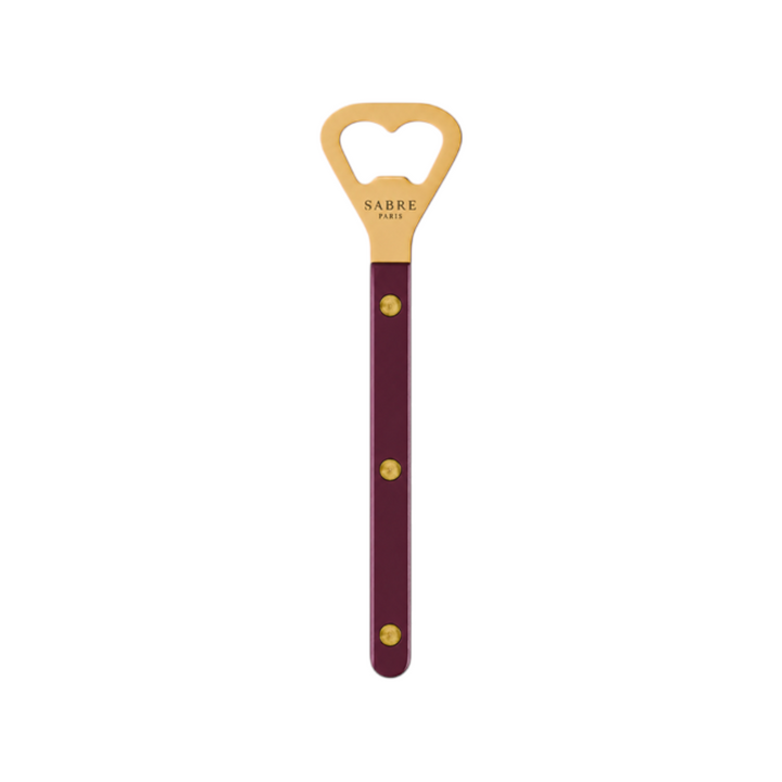 The Tiny Finch Bistro bottle opener in aubergine with a gold finish and visible rivets
