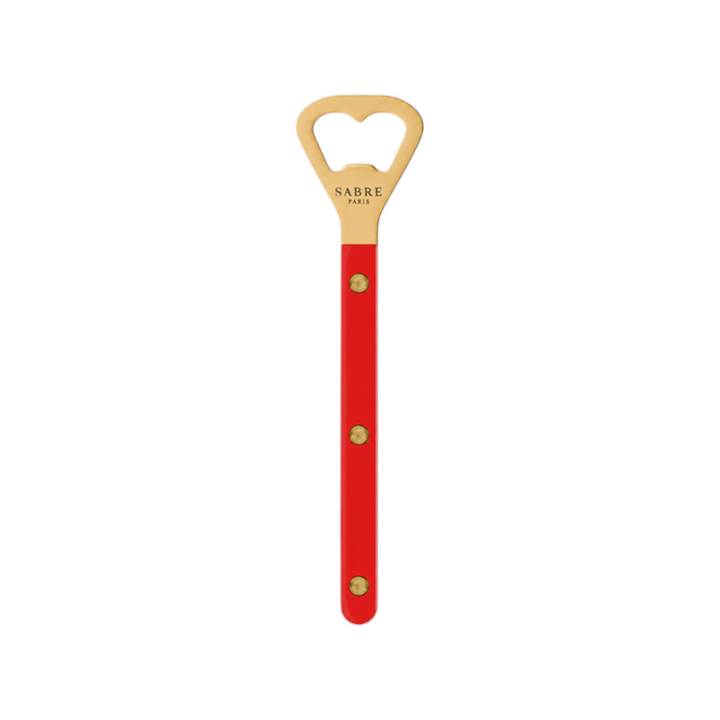 The Tiny Finch Bistro bottle opener in red with a gold finish and visible rivets, featuring Sabre Paris branding.