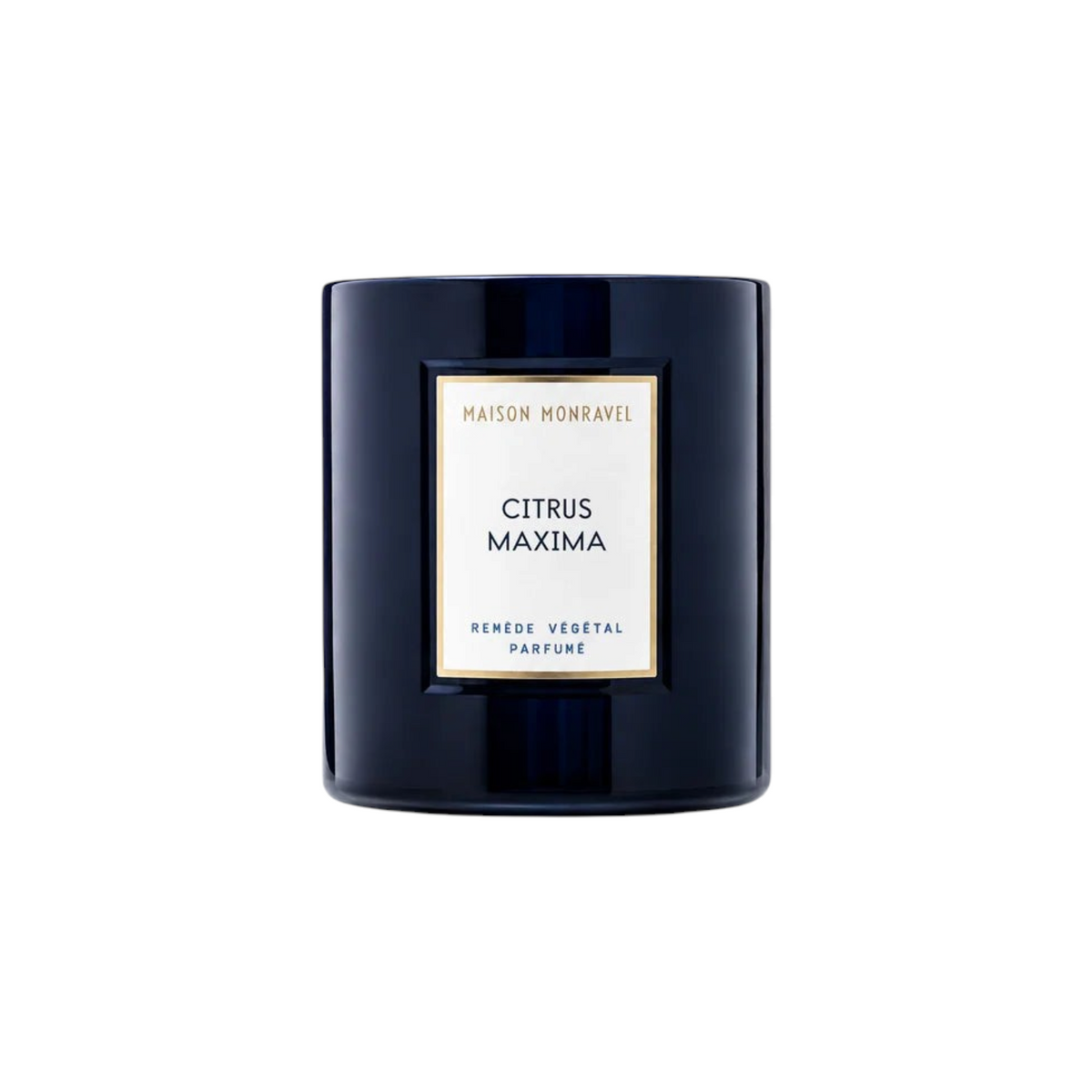 The Tiny Finch Citrus Maxima scented candle in a dark navy glass jar with a white and gold label.