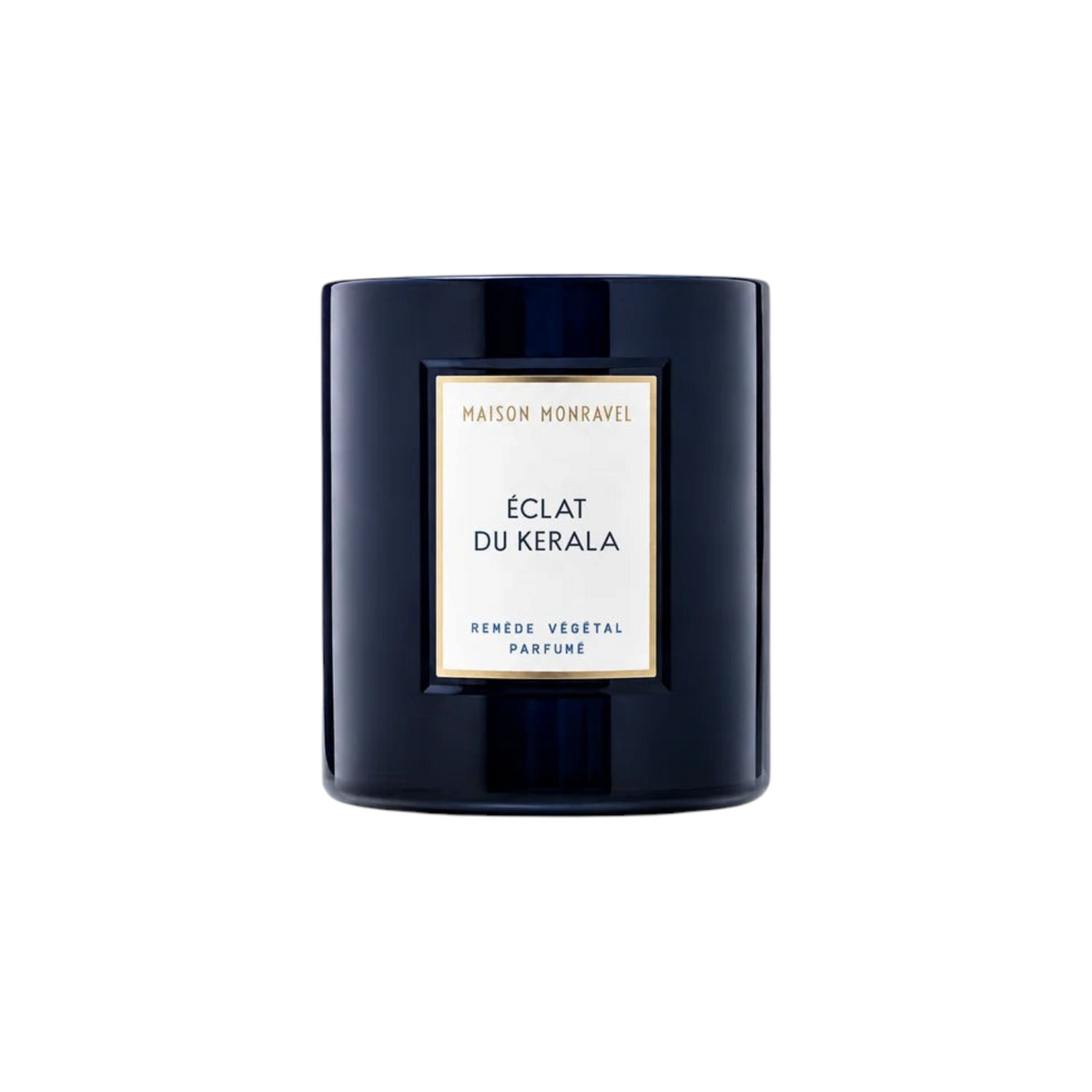 The Tiny Finch Candle Éclat du Kerala in a dark navy glass jar with a white label featuring gold accents.