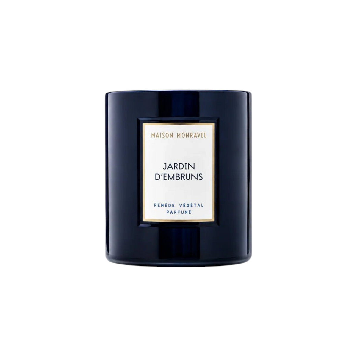 The Tiny Finch Jardin d’Embruns scented candle in a dark navy glass vessel with a white and gold label.