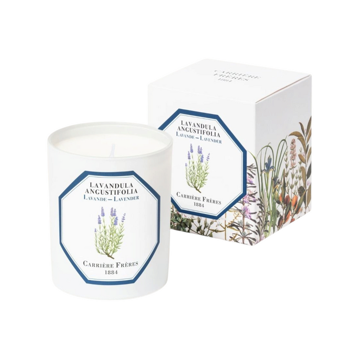 The Tiny Finch lavender scented candle in a white glass jar with a botanical label next to its matching floral box.