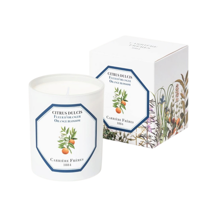 The Tiny Finch Orange Blossom scented candle in a white glass jar with botanical label and matching floral gift box