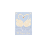 The Tiny Finch The Perfect Match matchbook featuring two white swans forming a heart on a light blue background.