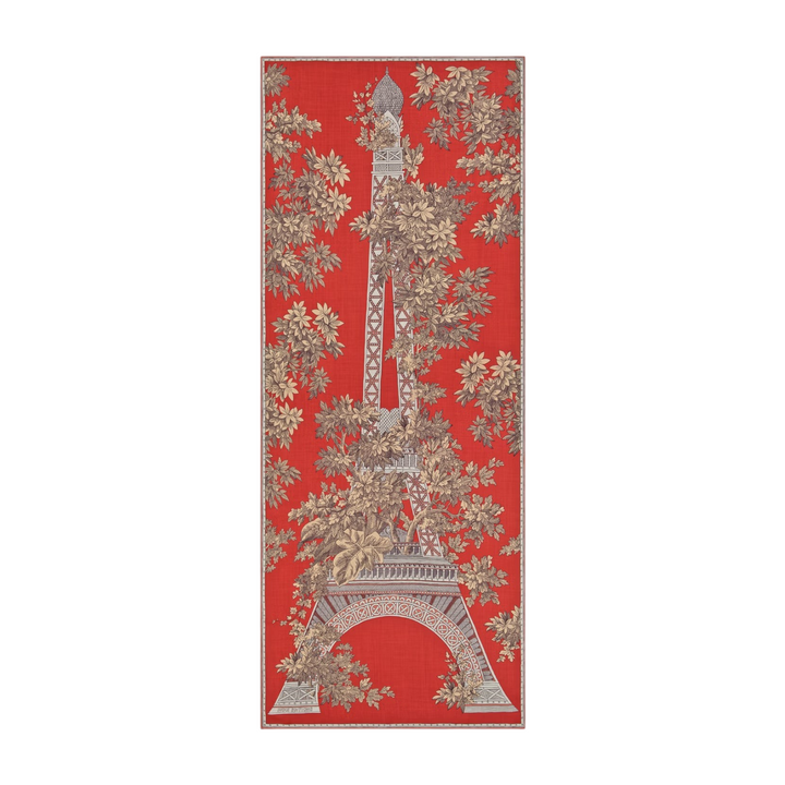 The Tiny Finch 1889 terracotta wool scarf featuring an Eiffel Tower and toile de Jouy floral print design