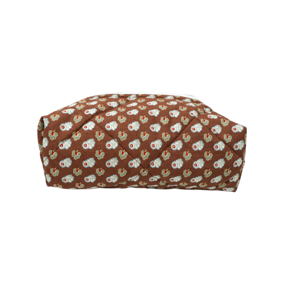 The Tiny Finch Georgia quilted cosmetic bag in brown floral fabric with a soft, padded texture.