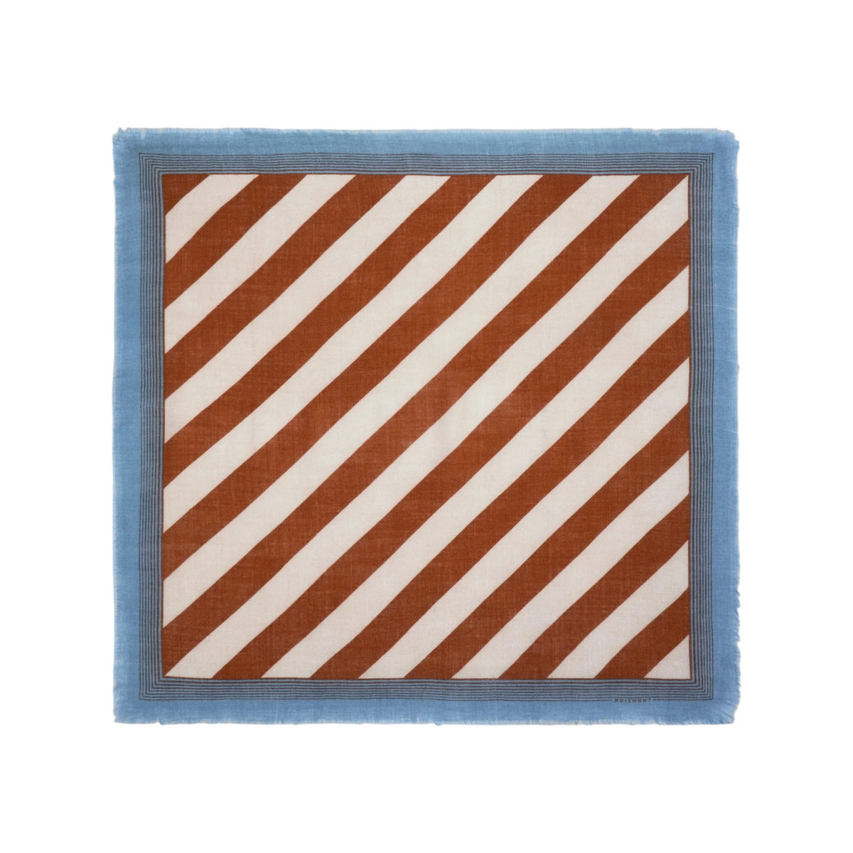 The Tiny Finch Moismont wool scarf in henna and white with diagonal stripes, blue contrast border, and fringed edges.