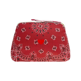 The Tiny Finch large red cotton toiletry bag with bandana print and hand-embroidered heart, featuring a gold zip.