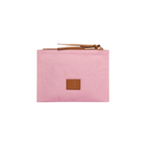 The Tiny Finch pink cotton pouch with brown leather trim and embossed logo patch