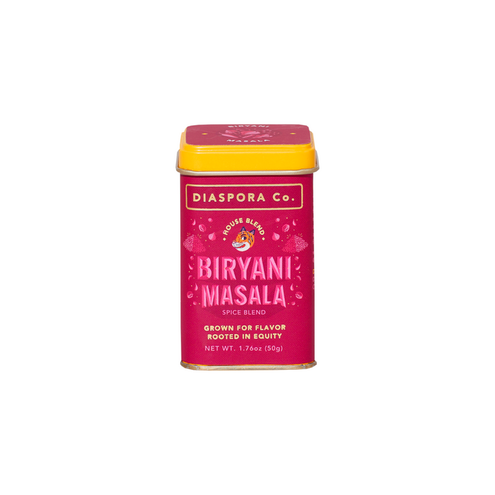 The Tiny Finch Diaspora Co. Biryani Masala spice blend in a rectangular red tin with a yellow lid and tiger logo.