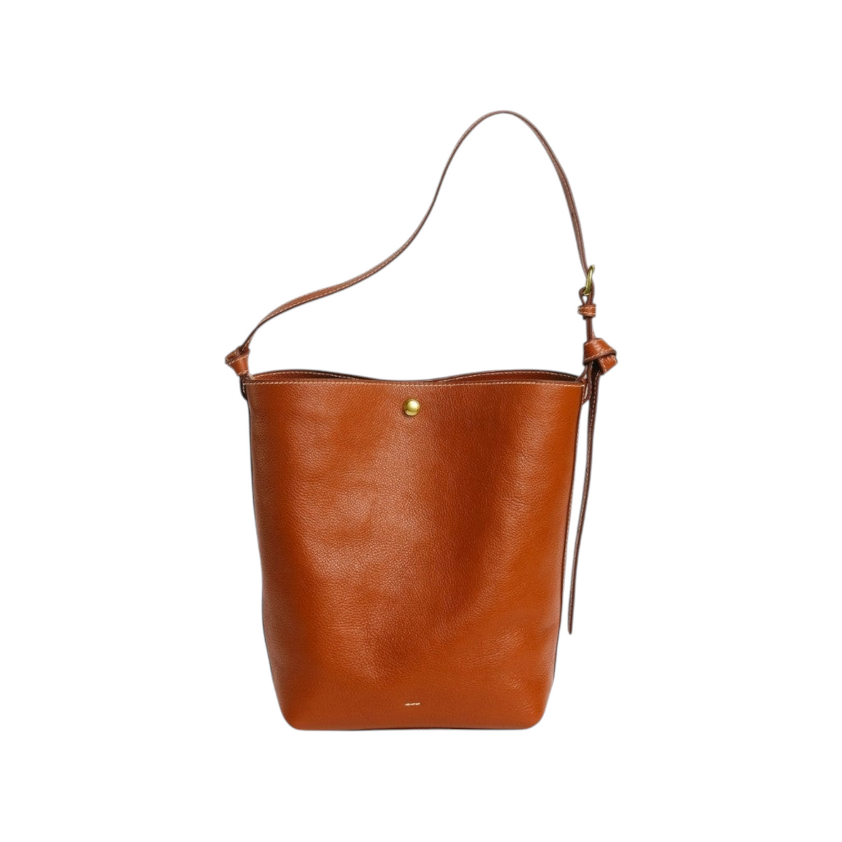 The Tiny Finch Lee brown vegetable tanned leather bucket bag with adjustable strap and solid brass hardware