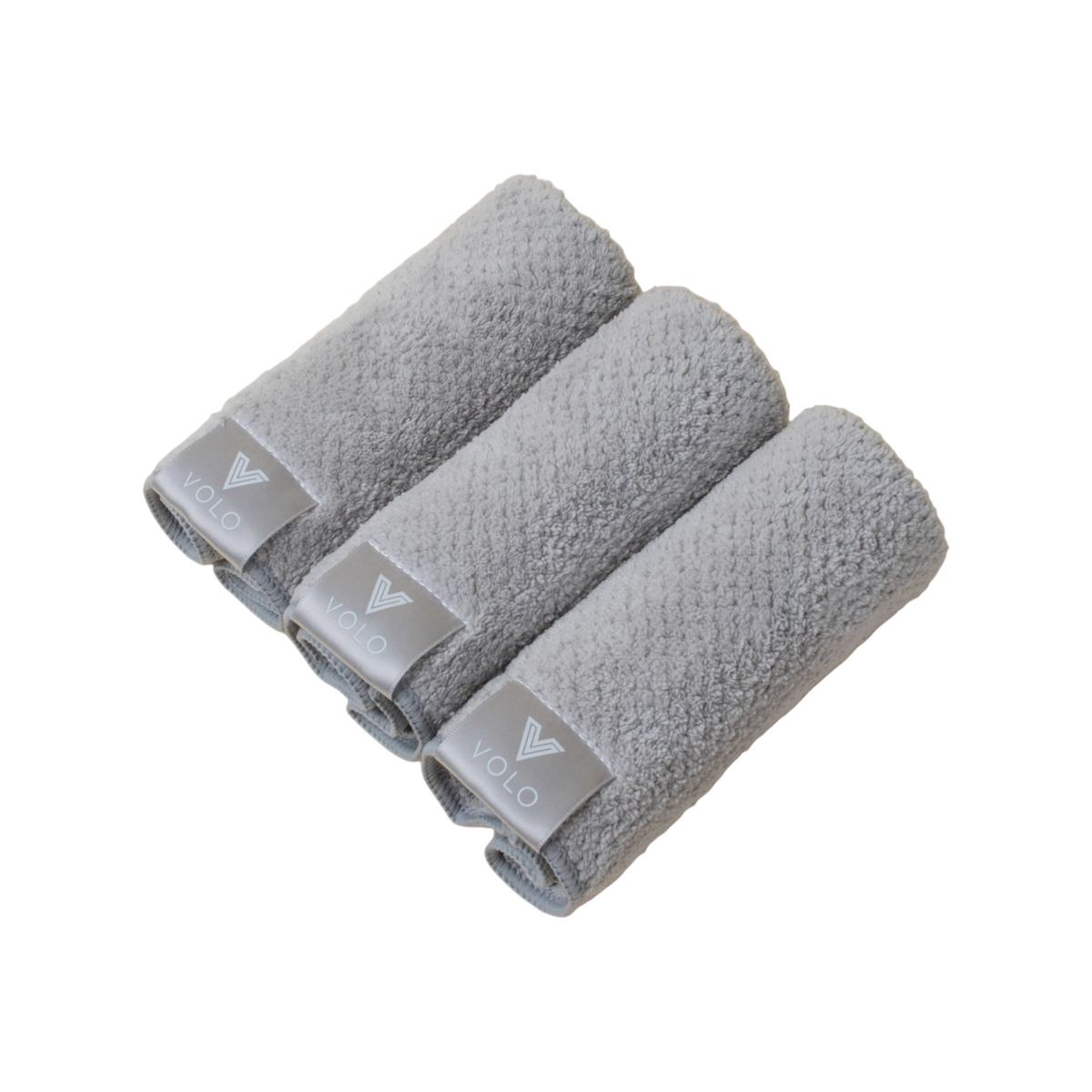 The Tiny Finch VOLO Beauty Luna Gray face towels in a pack of three, made from soft, absorbent Nanoweave fabric.