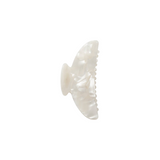 The Tiny Finch midi hair claw clip in white shell Italian acetate with a double-walled design.