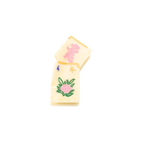 The Tiny Finch hand-painted biodegradable acetate hair claw clip featuring a cream mahjong tile design.