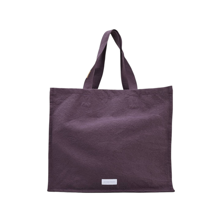 The Tiny Finch eggplant purple large organic cotton canvas tote bag with sturdy handles and a minimalist design.