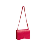 The Tiny Finch Val Carmine red leather crossbody bag with adjustable strap and gold hardware detail.