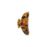 The Tiny Finch midi hair claw clip in classic tortoise pattern, handcrafted from durable Italian acetate.