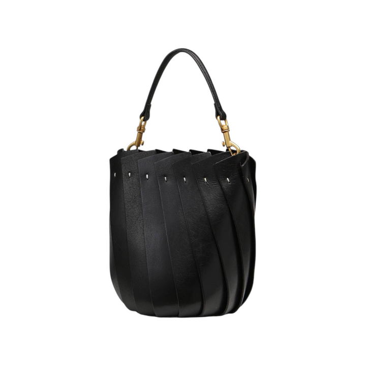 The Tiny Finch Bloom Bucket Tote in black Italian leather with a tulip-inspired silhouette and brass hardware.