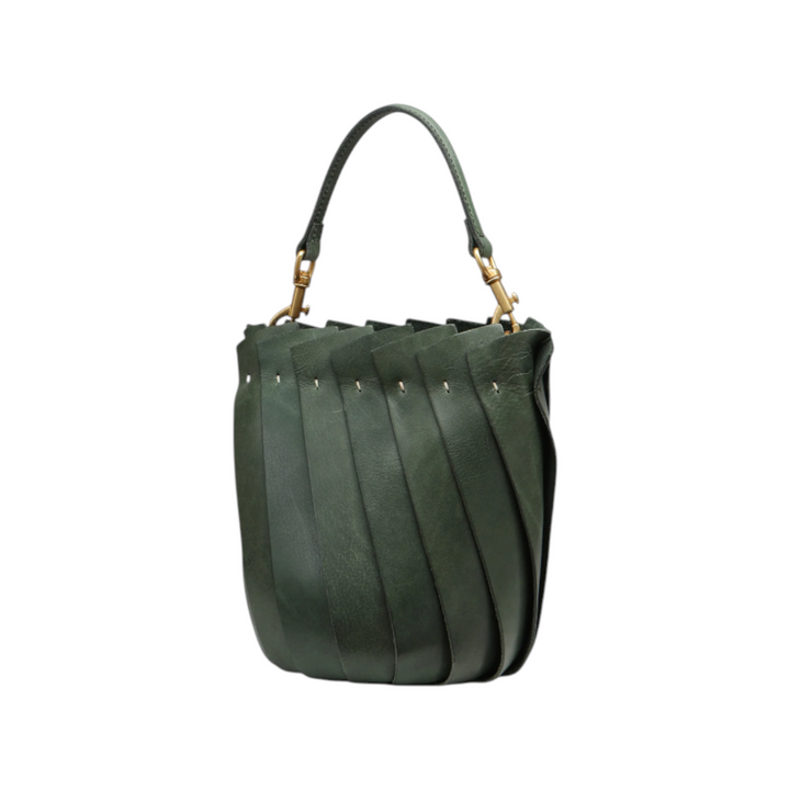 The Tiny Finch Bloom bucket tote in hunter green Italian leather with overlapping tulip-inspired panels and brass hardware
