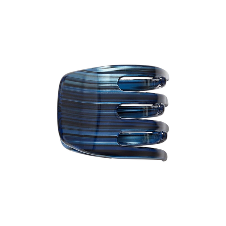 The Tiny Finch mini hair claw clip in indigo blue handcrafted Italian bio-acetate with a striped pattern
