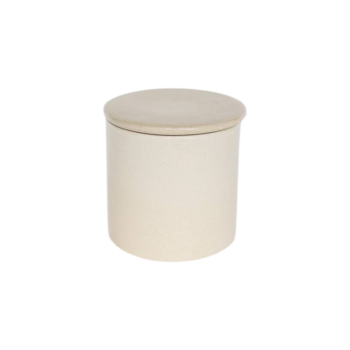 The Tiny Finch handmade stoneware butter keeper in a neutral cream finish for countertop storage.