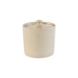 The Tiny Finch handmade beige stoneware canister with a matching lid, suitable for kitchen or bathroom storage.