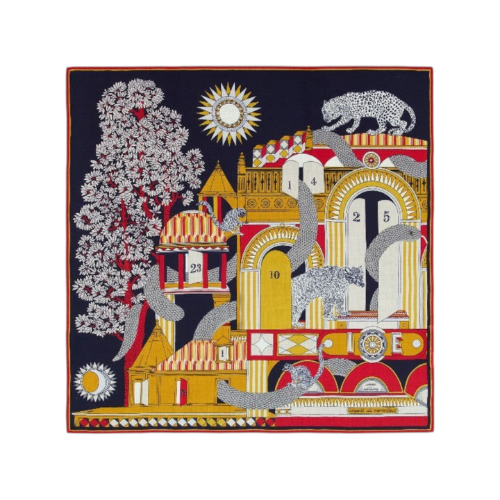 The Tiny Finch Nicolas navy square wool scarf featuring a detailed architectural print with leopards and sun motifs.