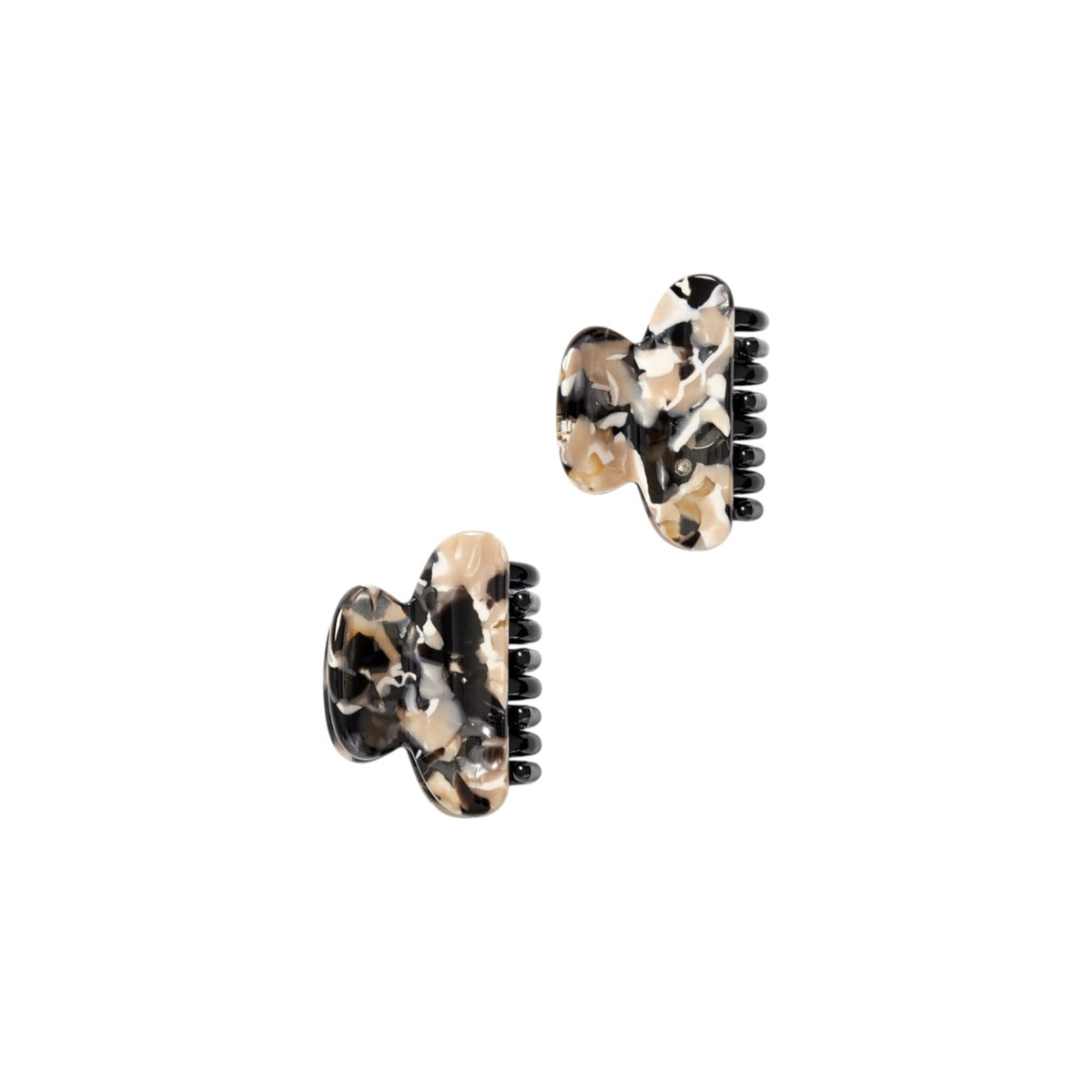 The Tiny Finch Twin Heirloom Claws in abalone patterned Italian acetate with stainless steel hardware.