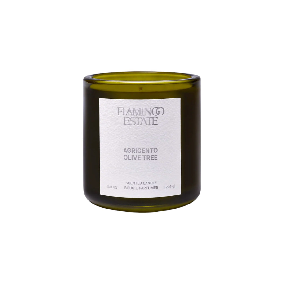 The Tiny Finch Agrigento Olive Tree scented candle in a dark green glass jar with a white textured label.