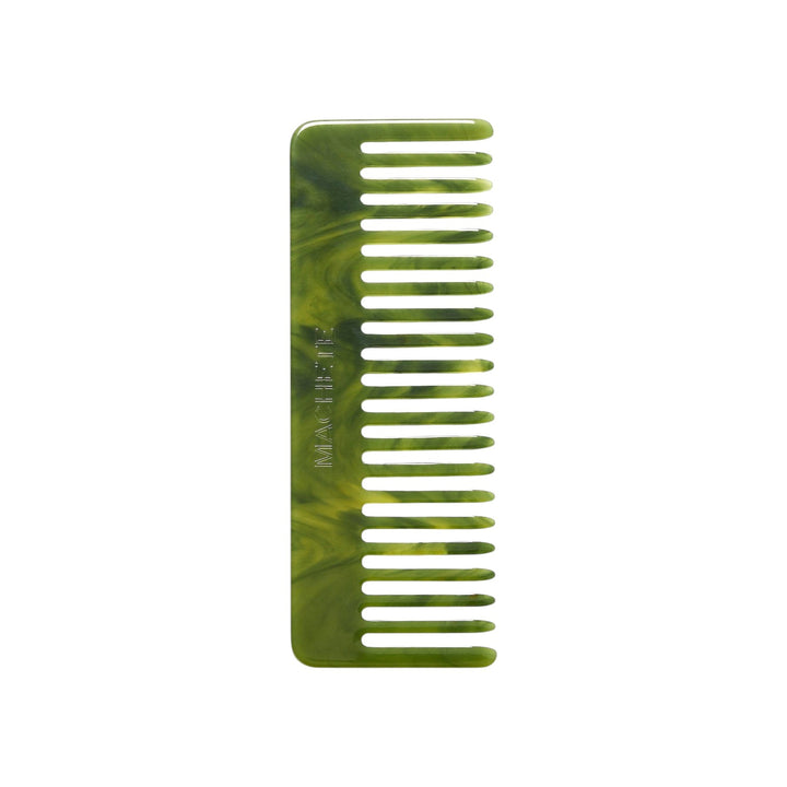 The Tiny Finch wide-tooth hair comb in a marbled algae green Italian acetate finish.