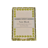The Tiny Finch note holder in Animalcules Bawden Green featuring a patterned paper tray and 250 ivory memo sheets.