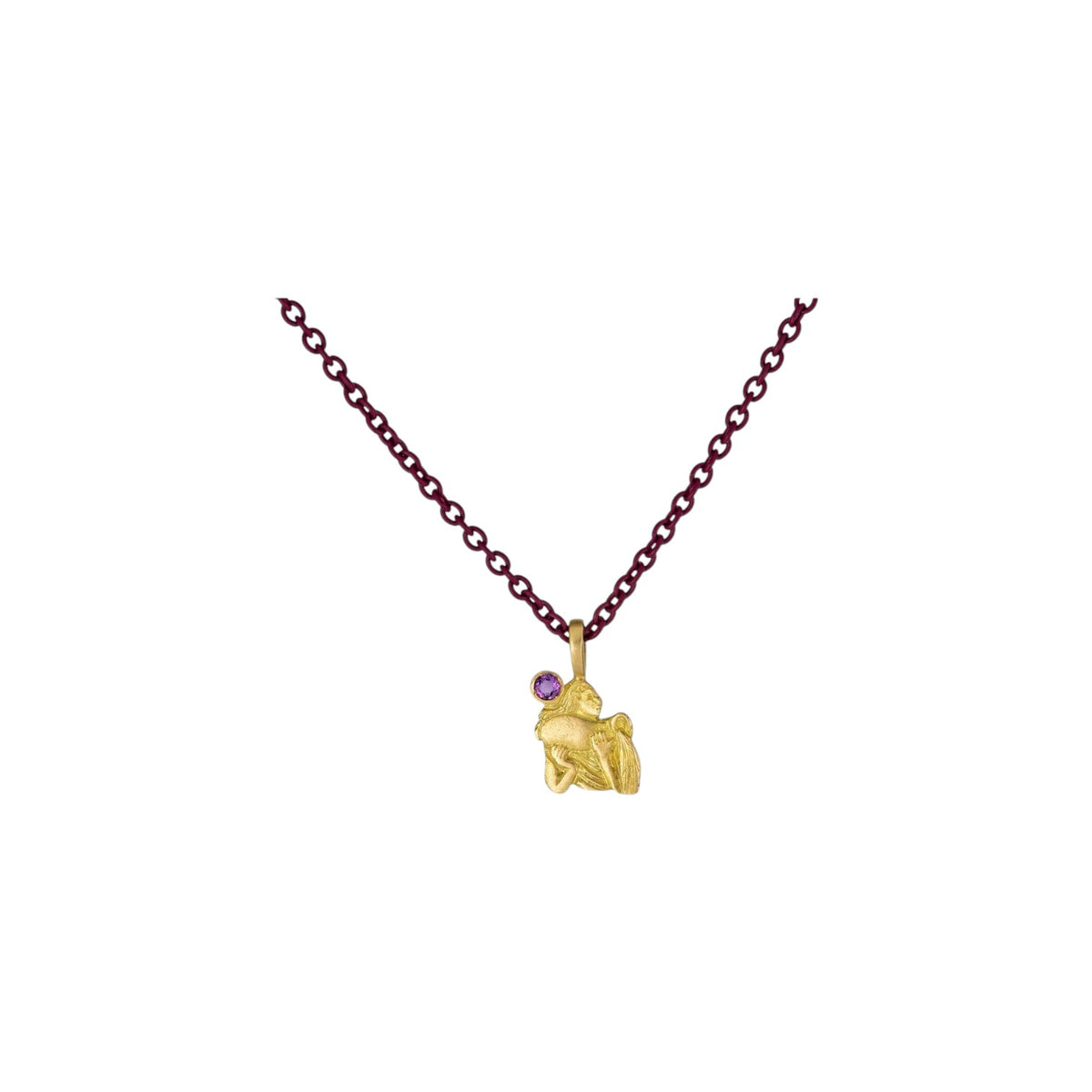 The Tiny Finch Aquarius zodiac pendant in 18k yellow gold with a satin finish and a small round amethyst gemstone.