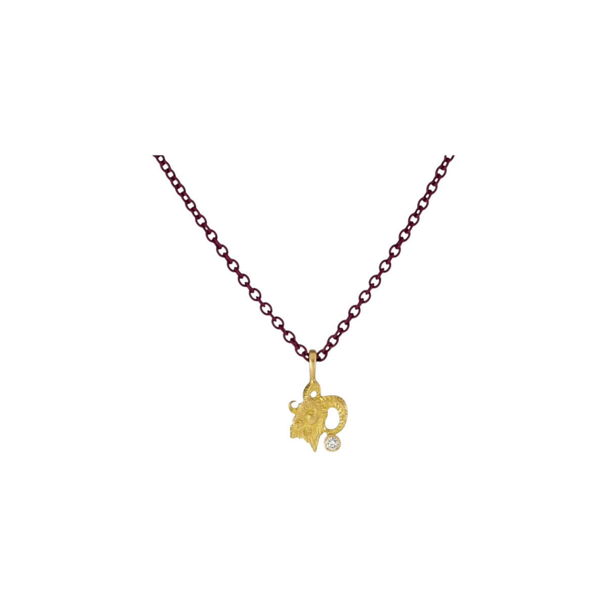 The Tiny Finch 18k yellow gold Aries zodiac pendant with a satin finish and a brilliant diamond accent.