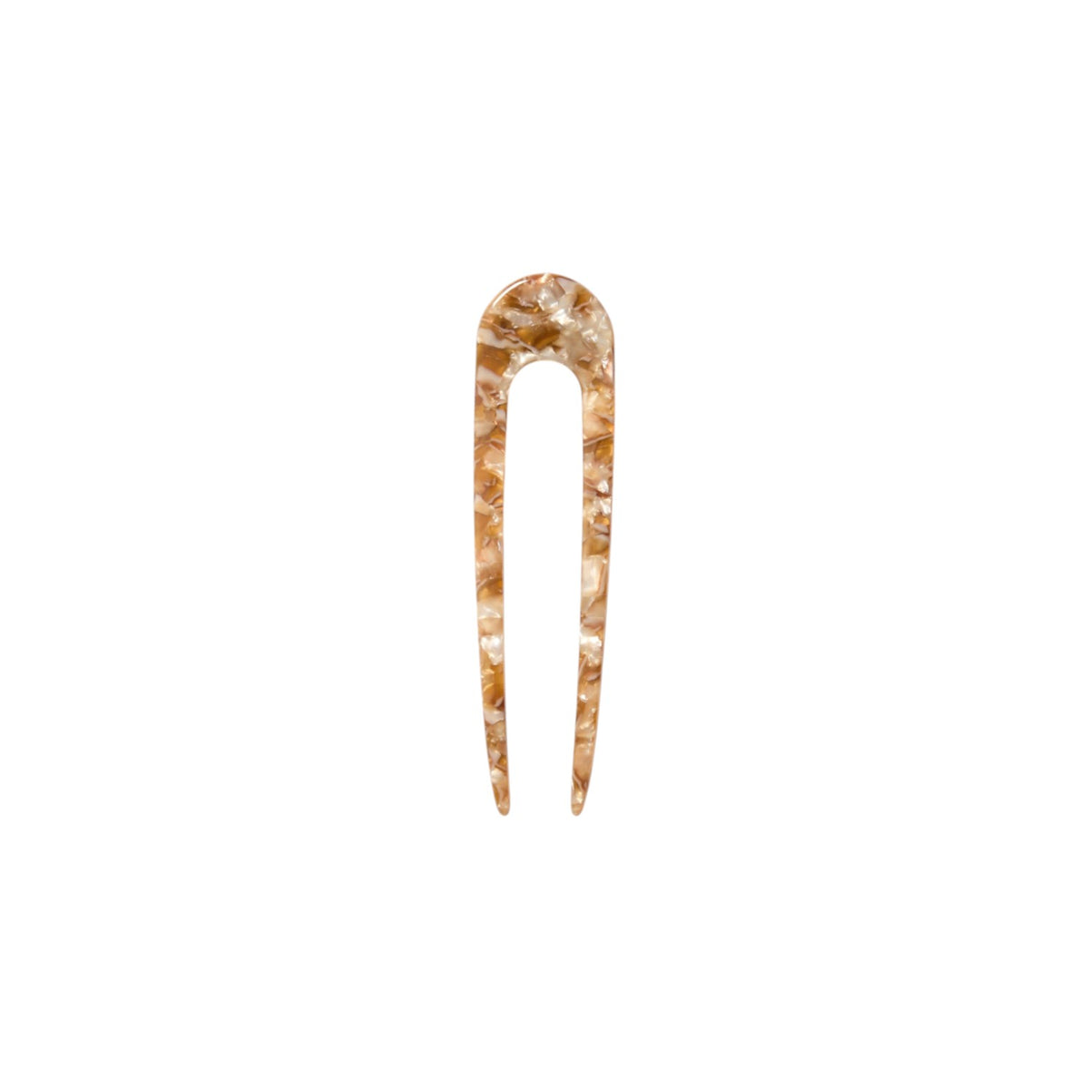 The Tiny Finch French hair pin in a Baja tortoise shell pattern, hand-sculpted from fine Italian acetate.