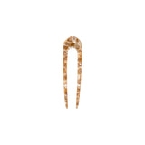 The Tiny Finch French hair pin in a Baja tortoise shell pattern, hand-sculpted from fine Italian acetate.