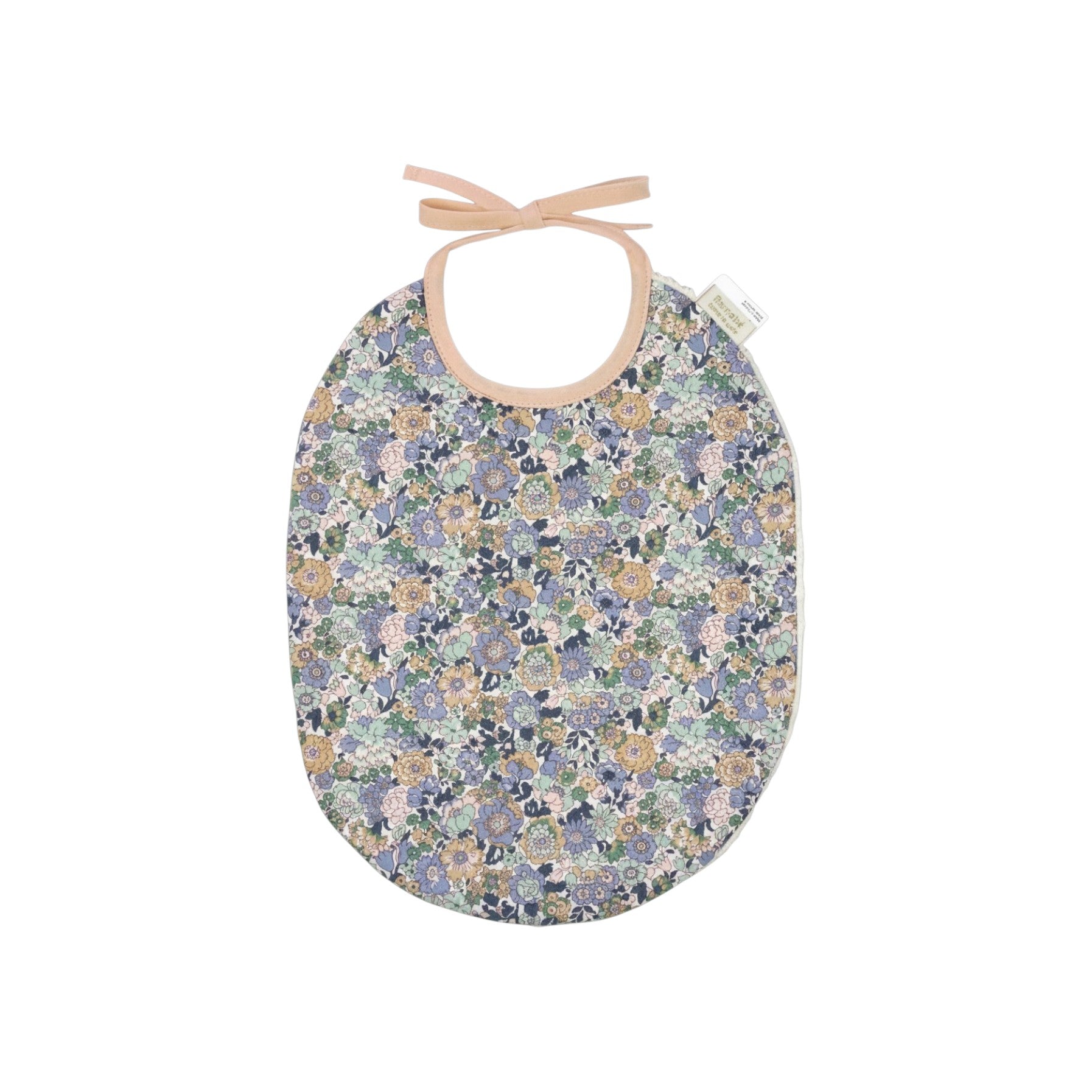 The Tiny Finch Bib Jenny featuring a floral Liberty fabric print with a soft sponge backing and tie closure.