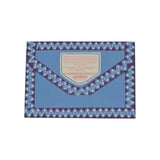 The Tiny Finch birthday banner storage wallet in blue with a decorative star and scallop pattern border.