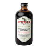 The Tiny Finch Bittermilk No. 1 bourbon barrel aged old fashioned cocktail mixer in a glass bottle