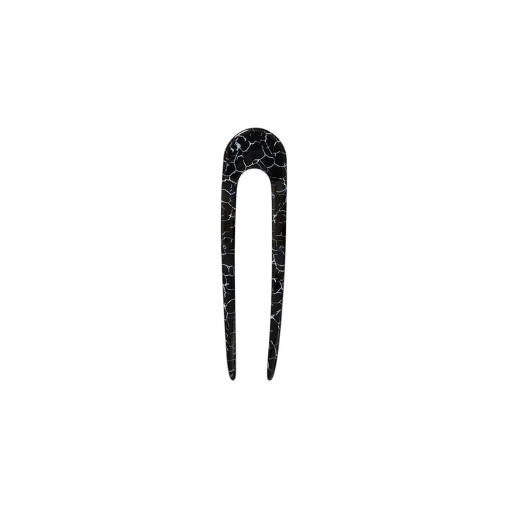 The Tiny Finch French hair pin in black marble Italian acetate with a classic U-shaped design for all hair types.